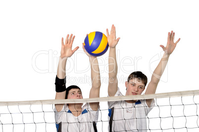 Volleyball players with the ball on a white