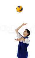 Volleyball player in high flying with a ball