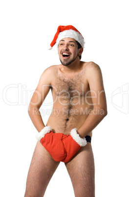 Sexy muscular man wearing a Santa Claus hat