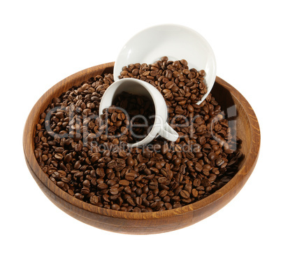 Coffee beans in a wooden plate