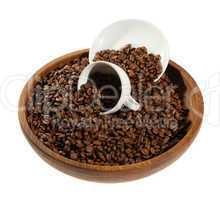 Coffee beans in a wooden plate
