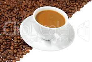 coffee mug against the backdrop of coffee beans