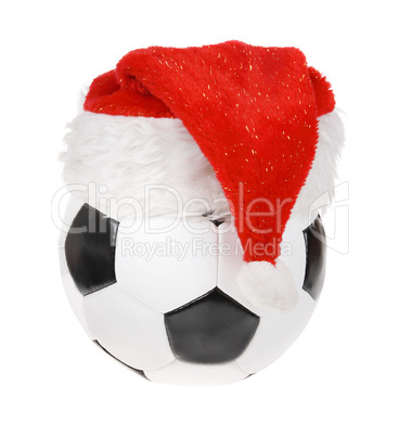 Santa Claus hat on the soccer ball. (isolated)