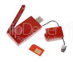 Red modem with USB cable on the white background