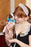 Female waiter with a small dog