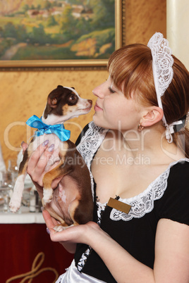 Female waiter with a small dog