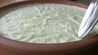 Homemade yogurt in a clay bowl