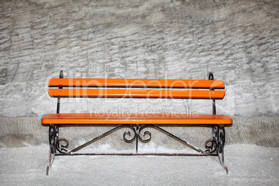Wooden bench against the salt wall