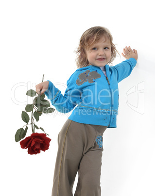 Little girl with a red rose