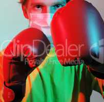 Doctor in red boxing gloves fighting against influenza