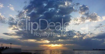 silhouette of the yacht at sunset