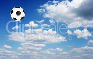 Football ball in the sky