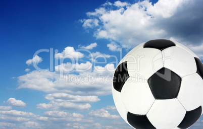 Football ball in the sky