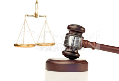 Gavel in action and scale of justice