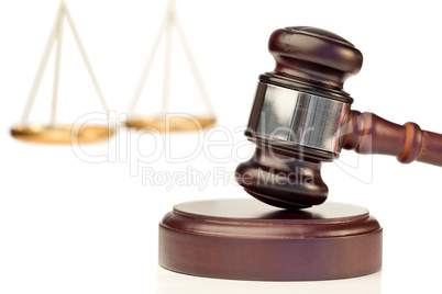 Brown gavel and scale of justice