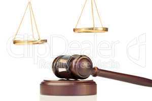 Fixed gavel and golden scale of justice