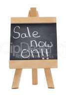 Chalkboard with the words sale now on written on it