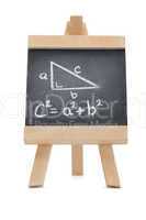 Chalkboard with a mathematical formula and a geomerical figure w