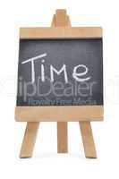 Chalkboard with the word time written on it