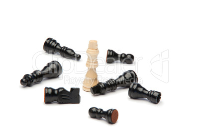 White king and dark pieces of chess
