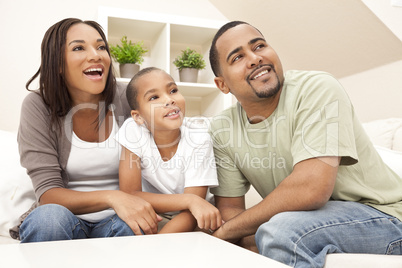 Happy Smiling African American Family At Home