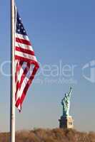 Statue of Liberty, Stars and Stripes Flag, New York City
