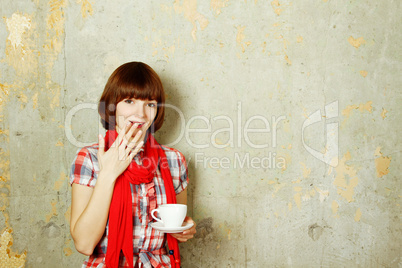 Closeup of an attractive woman with coffee