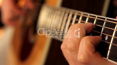 man playing guitar close up 3