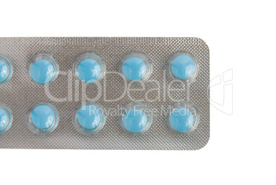 Close-up of a pack of blue pills