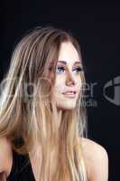 Young amazing blond girl look at light