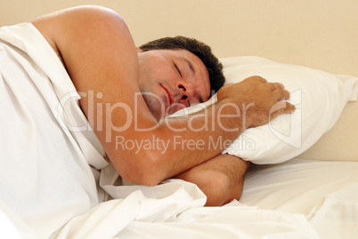 Man sleeping in bed