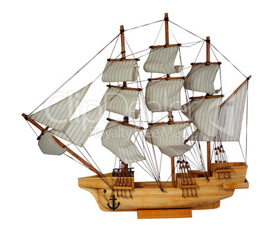 Model of ship with sails on the white background