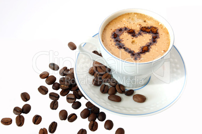 coffee mug against the backdrop of coffee beans