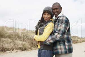 Romantic Young Couple On Winter Beach