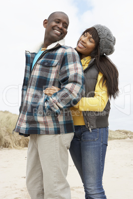 Romantic Young Couple On Winter Beach