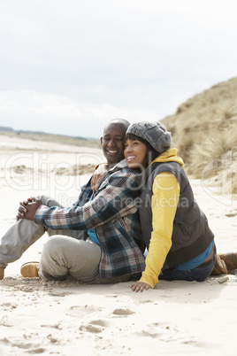 Romantic Young Couple On Winter Beach