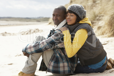 Romantic Young Couple On Winter Beach