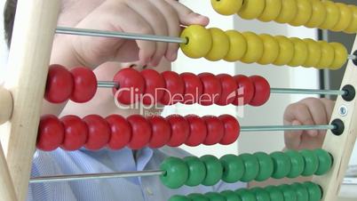 Little Boy using abacus