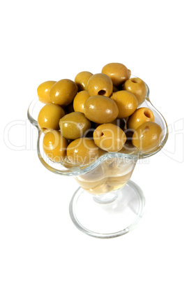 Green olives in a glass vase