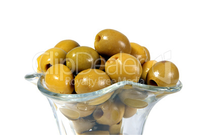 Green olives in a glass vase