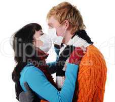 man embraces a woman wearing masks, flu,