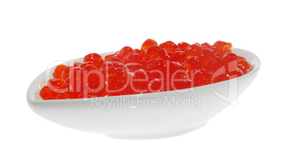Red caviar in a white plate
