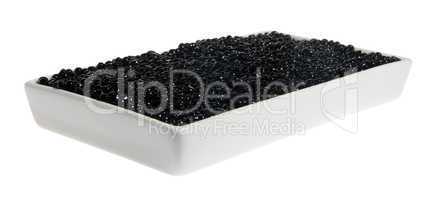 Black caviar in a white plate