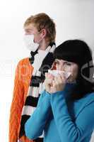 girl was ill of influenza, a man stands behind a mask