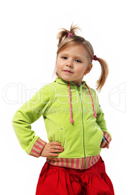 little girl stands near a wall, red skirt, green woman's jacket