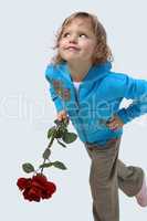 Little girl with a red rose