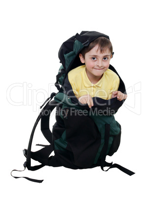 small boy in a big tourist backpack