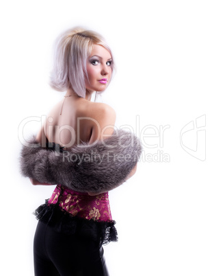 Beauty blonde in corset and fur boa look at you
