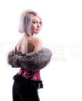 Beauty blonde in corset and fur boa look at you