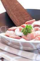 frisches Schweinefleisch in Pfanne / fresh pork meat in a pan